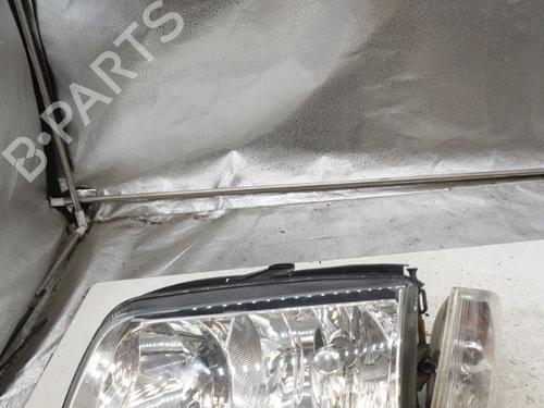 Used Left headlight VW POLO (6N2) 1.4 TDI (75 hp) 24423157