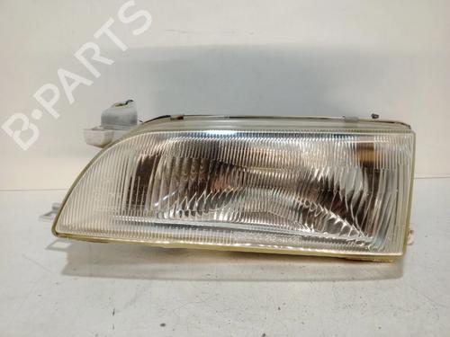Used Left headlight TOYOTA COROLLA (_E10_) 1.3 XLI 16V (EE101) (88 hp) 23491642
