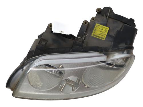 Used Left headlight VW TOURAN (1T1, 1T2) 1.9 TDI (105 hp) 25337786