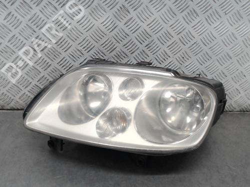 Used Left headlight VW TOURAN (1T1, 1T2) 1.9 TDI (105 hp) 23054335