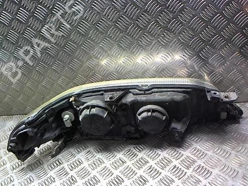 Used Left headlight VW POLO III (6N1) 64 1.9 D (64 hp) 23049487