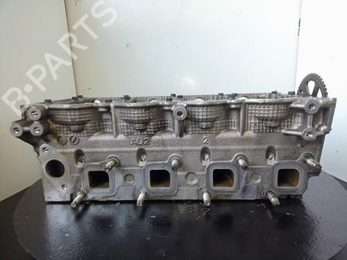 Used Cylinder head NISSAN ALMERA II Hatchback (N16) 2.2 Di (110 hp) 10972224