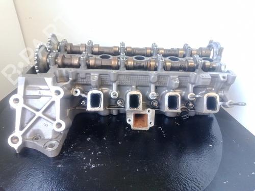 Used Cylinder head MG MG ZT 2.0 CDTi (131 hp) 10972323