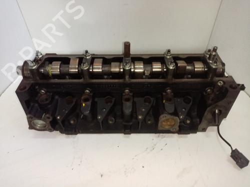Used Cylinder head FORD FOCUS I (DAW, DBW) 1.8 Turbo DI / TDDi (90 hp) 10972378