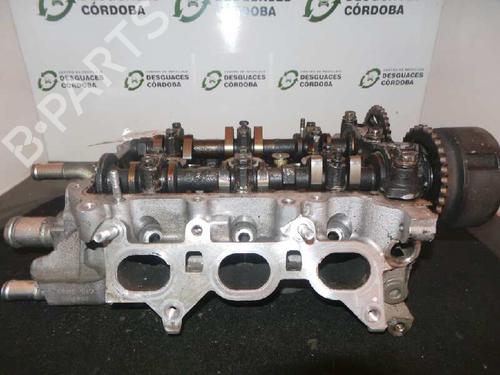 Used Cylinder head CITROËN C1 (PM_, PN_) 1.0 (68 hp) 10972535