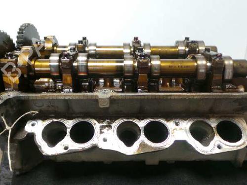 Used Cylinder head FORD COUGAR (EC_) 2.5 V6 24V (170 hp) 10972482