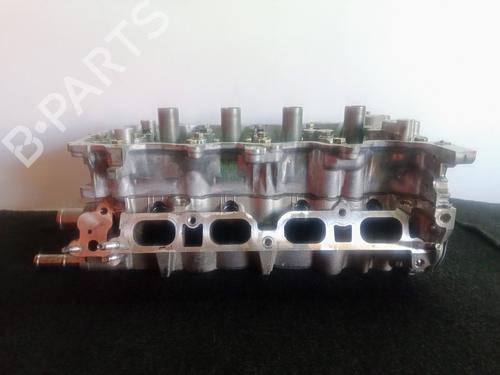Used Cylinder head TOYOTA YARIS (_P13_) 1.3 (NSP130_, NSP130) (99 hp) 10972714