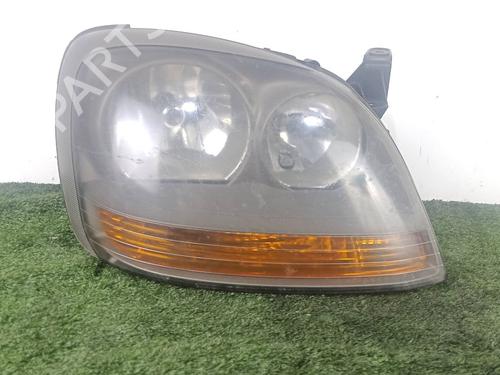 Used Right headlight NISSAN ALMERA TINO (V10) 2.2 dCi (115 hp) 27995238