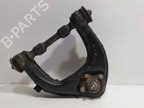 Used Left front suspension arm MITSUBISHI L200 (K7_T, K6_T, K5_T) [1996-2011]  17713235