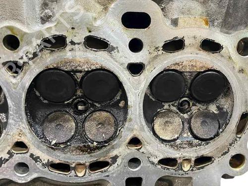 Used Cylinder head FORD FIESTA V (JH_, JD_) 1.4 16V (80 hp) 29298682