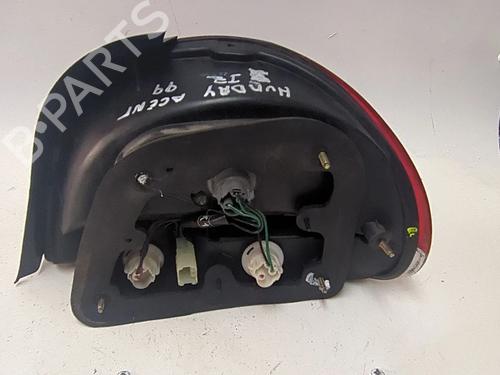 Left taillight HYUNDAI ACCENT I (X-3) 1.5 i 12V | BP24876633C34 