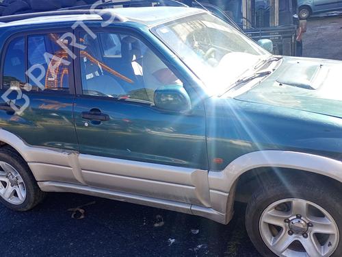 Brugte SUZUKI GRAND VITARA I (FT, HT) 2.0 HDI 110 16V 4x4 (SQ420D, TD83V, JA420WD) 4995045