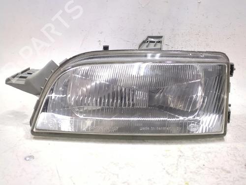 Used Left headlight FIAT PUNTO (176_) 1.7 TD (69 hp) 28718410