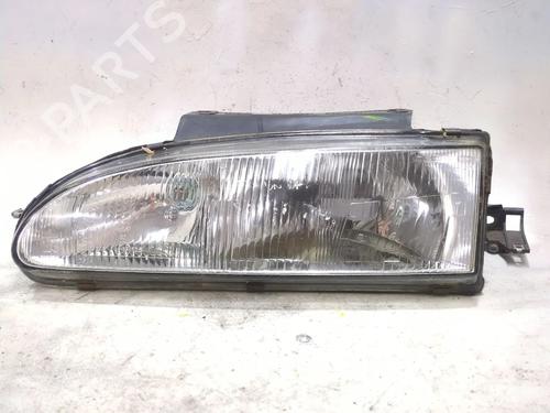 Used Left headlight HYUNDAI S COUPE (SLC) 1.5 i (88 hp) 28599427