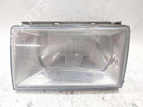 Used Left headlight FIAT REGATA (138_) 70 1.3 (68 hp) 30529075