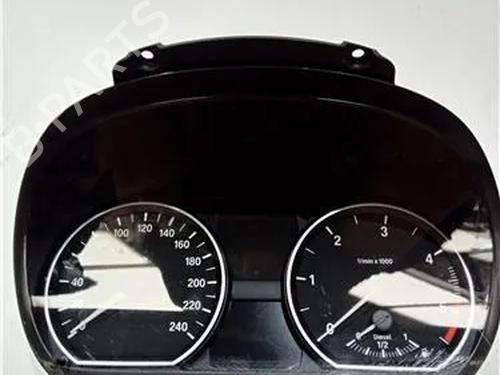 Used Instrument cluster BMW 1 (E81) 118 i (143 hp) 23909344