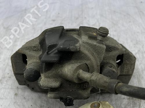 Used Right front brake caliper FORD MONDEO II (BAP) 1.8 TD (90 hp) 23703384