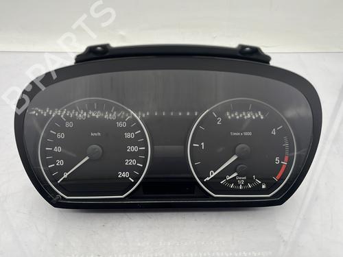 Used Instrument cluster BMW 1 (E81) 118 d (143 hp) 23760549