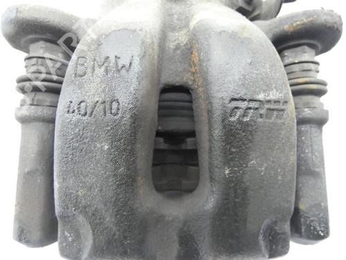 Used Left rear brake caliper BMW 1 (E81) 116 d (116 hp) 23693560