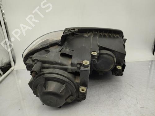 Used Left headlight VW TOURAN (1T1, 1T2) 1.9 TDI (105 hp) 23718962