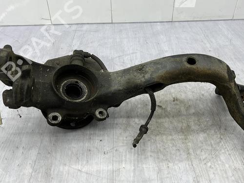 Used Right front steering knuckle VW PASSAT B5 Variant (3B5) 1.9 TDI (110 hp) 23687303