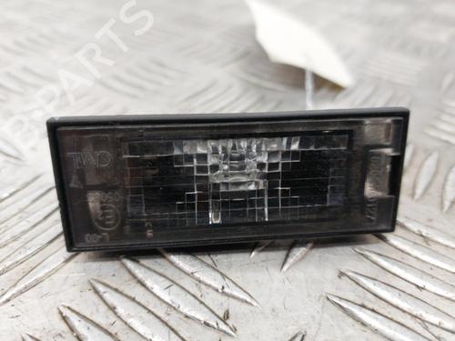 Used Licence plate light RENAULT CLIO III (BR0/1, CR0/1) 1.5 dCi (C/BR0G, C/BR1G) (68 hp) 23658952