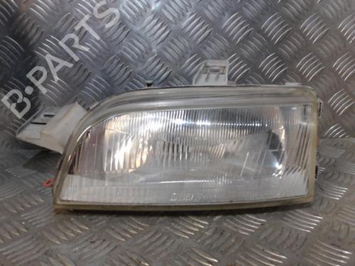 Used Left headlight FIAT PUNTO (176_) 1.7 TD (71 hp) 24273529