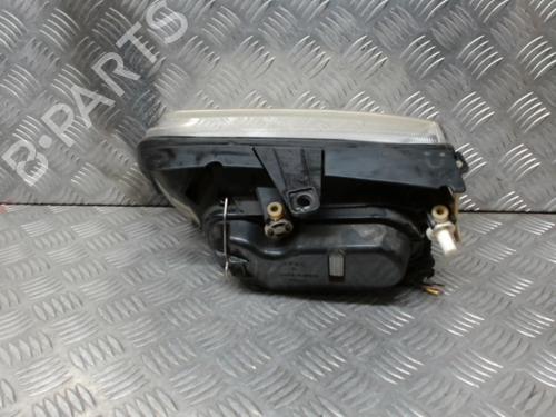Used Right headlight VW POLO (6N2) 1.4 TDI (75 hp) 24277032