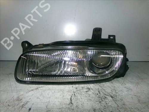 Used Left headlight MAZDA 323 F V (BA) 1.5 16V (BA11) (88 hp) 24568018