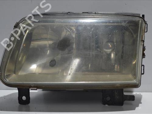 Used Left headlight VW POLO (6N2) 1.4 TDI (75 hp) 24563498