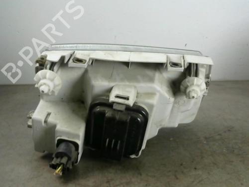 Used Left headlight VW POLO III (6N1) 60 1.4 (60 hp) 25583312