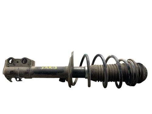 Venstre fortil støddæmper TOYOTA YARIS (_P9_) 1.4 D-4D (NLP90_, NLP90R) (90 hp) 25565442