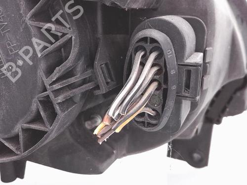 Used Left headlight VW TOURAN (1T1, 1T2) 1.9 TDI (105 hp) 25357543