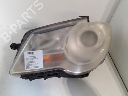 Used Left headlight VW TOURAN (1T1, 1T2) 1.9 TDI (105 hp) 24750210