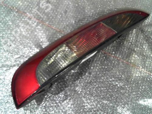 Used Left taillight OPEL CORSA C (X01) 1.3 CDTI (F08, F68) (70 hp) 24743321