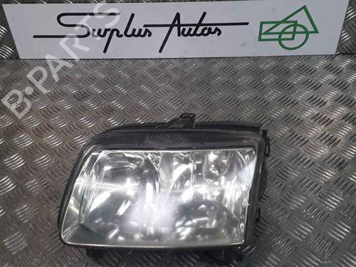 Used Left headlight VW POLO (6N2) 1.4 TDI (75 hp) 25181721