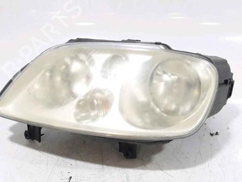 Used Left headlight VW TOURAN (1T1, 1T2) 1.9 TDI (105 hp) 25182187