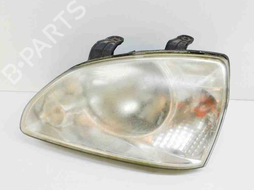 Used Left headlight KIA CARENS I MPV (FC, FJ) 2.0 CRDi (113 hp) 8412086