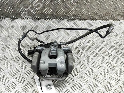 Używane Zacisk hamulca tylnego prawego PEUGEOT 2008 II (UD_, US_, UY_, UJ_, UR_, UC_) 1.2 Hybrid 136 (URHPYC, USHPY) (136 hp) 28552571