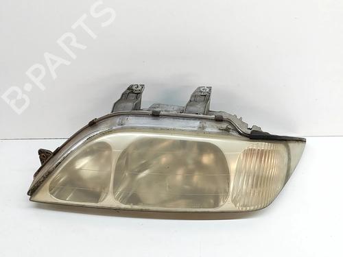 Used Left headlight SSANGYONG MUSSO (FJ) 2.3 D (79 hp) 24975098