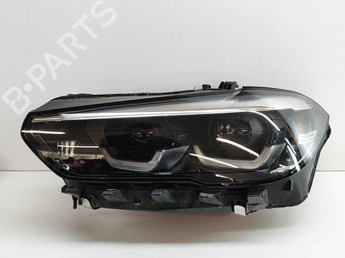Used Left headlight BMW X5 (G05, F95) xDrive 45 e Plug-in-Hybrid (286 hp) 19744156