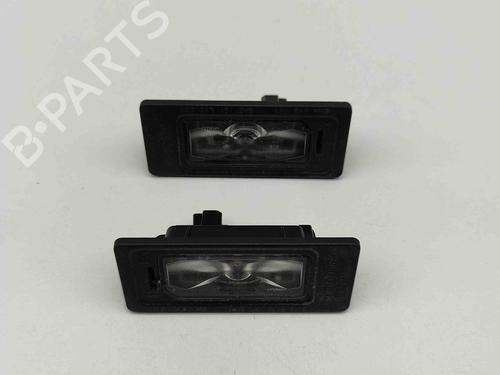 Używane Lampa oświetlenia tablicy rejestracyjnej PORSCHE CAYENNE Coupe (9YB) 3.0 AWD (9YBAA1) (340 hp) 27794076