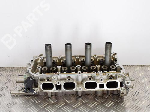 Used Cylinder head Cylinder head TOYOTA YARIS (_P13_) 1.3 (NSP130_, NSP130) (99 hp) 6730572 6730572