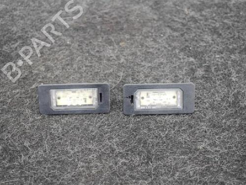 Used Licence plate light BMW 1 Convertible (E88) 135 i (306 hp) 14664894