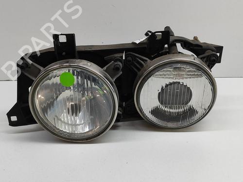 Used Left headlight BMW 5 (E34) 518 i (115 hp) 21809582