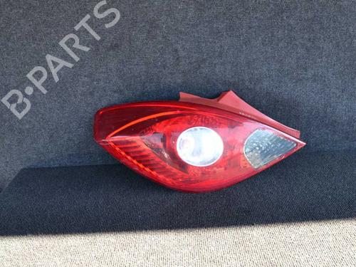 Used Left taillight OPEL CORSA D (S07) 1.2 (L08, L68) (80 hp) 7736257
