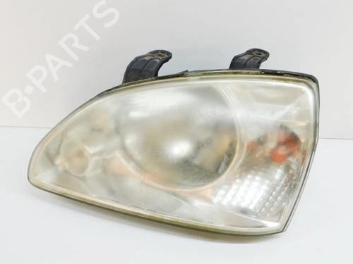 Used Left headlight KIA CARENS I MPV (FC, FJ) 2.0 CRDi (113 hp) 8412086