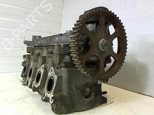 Used Cylinder head VW POLO (6N2) 1.4 (60 hp) 25649383