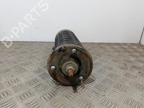 Used Left front shock absorber NISSAN PATHFINDER III (R51) 3.0 dCi (231 hp) 25670107