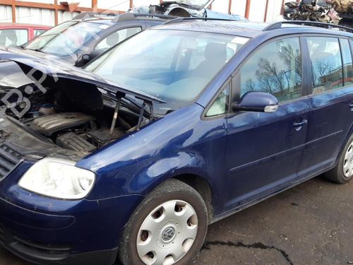 Right headlight VW TOURAN (1T1, 1T2) 2.0 TDI | BP25663427C29 